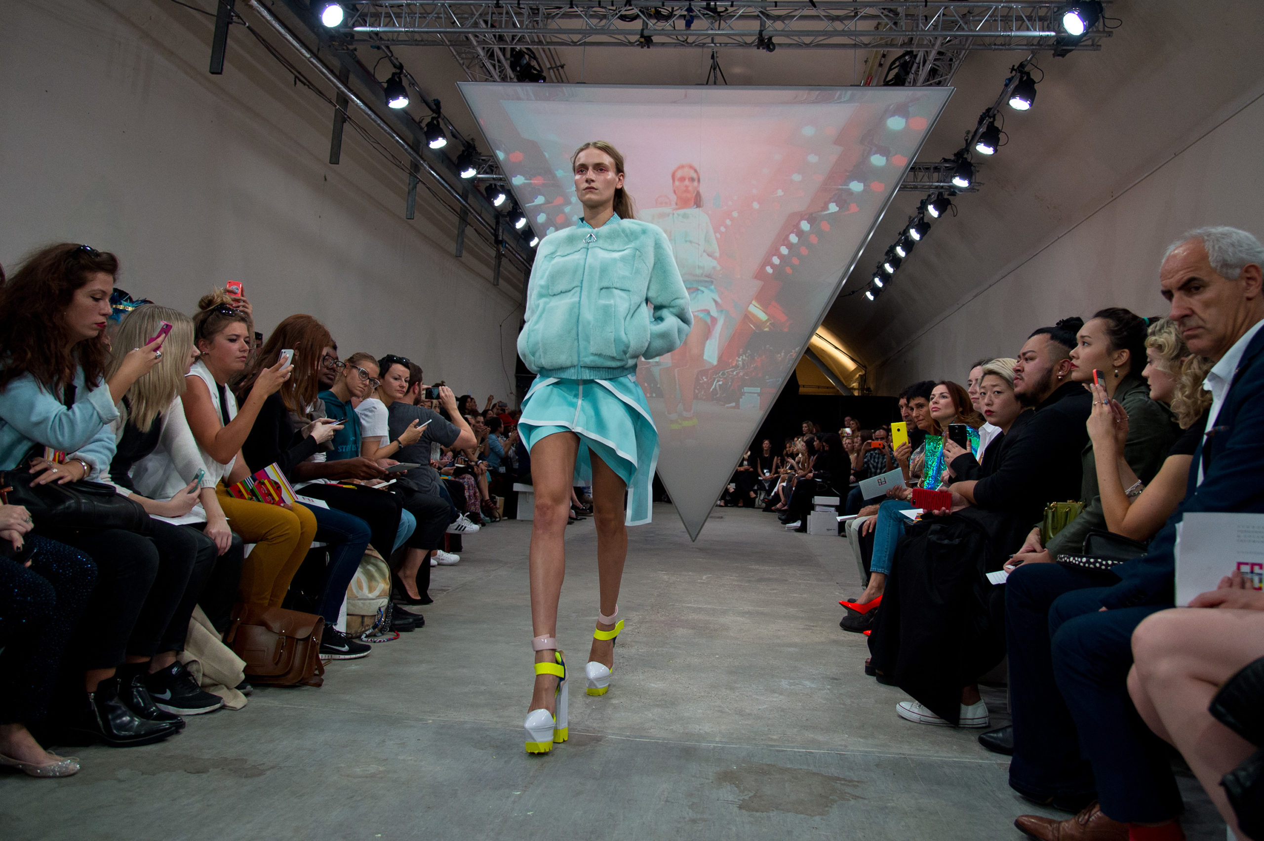 Model walking down catwalk for Fyodor Golan SS15 show, Fashion Innovation Agency