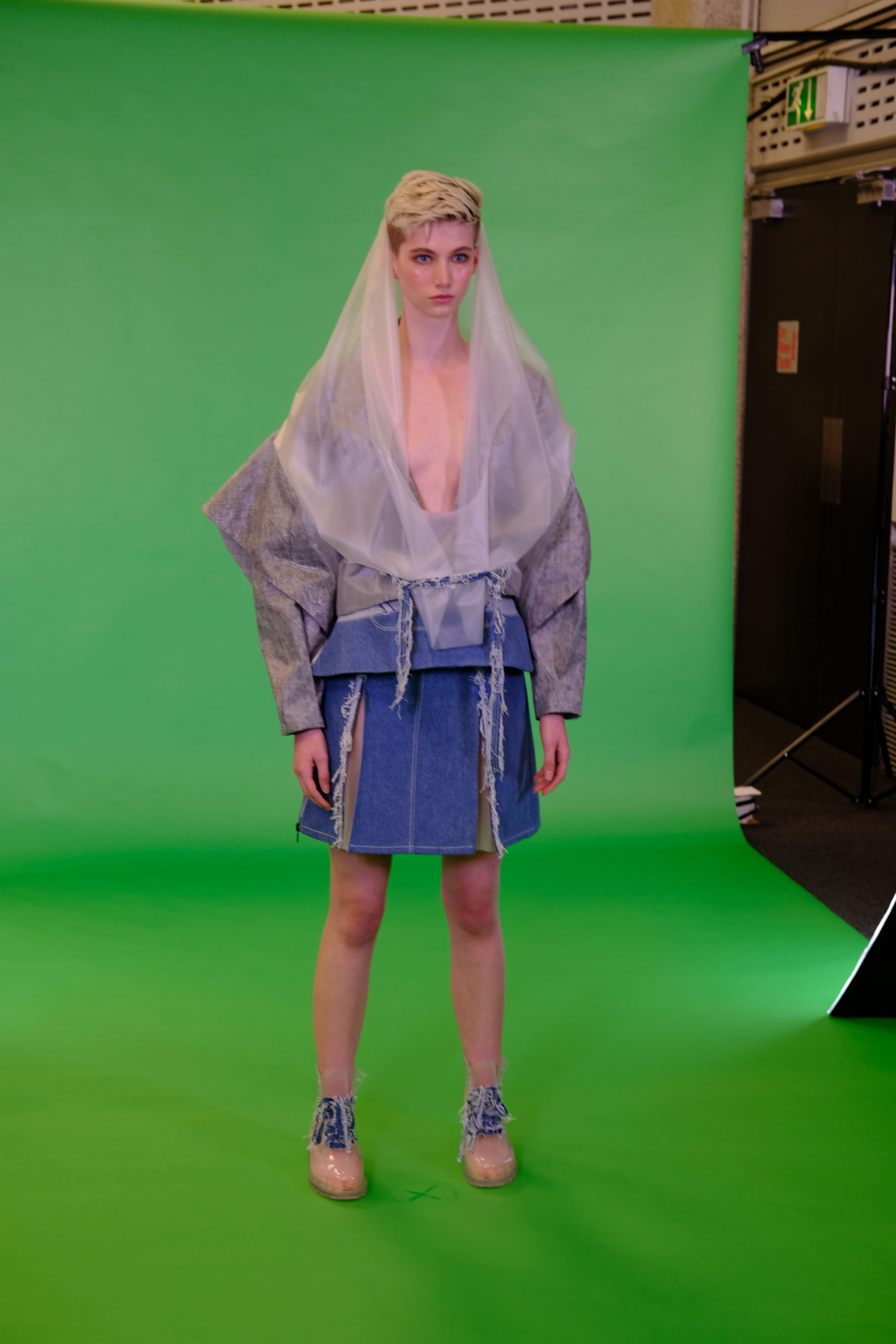 Model in from a green screen photo shoot set up, Fashion Innovation Agency