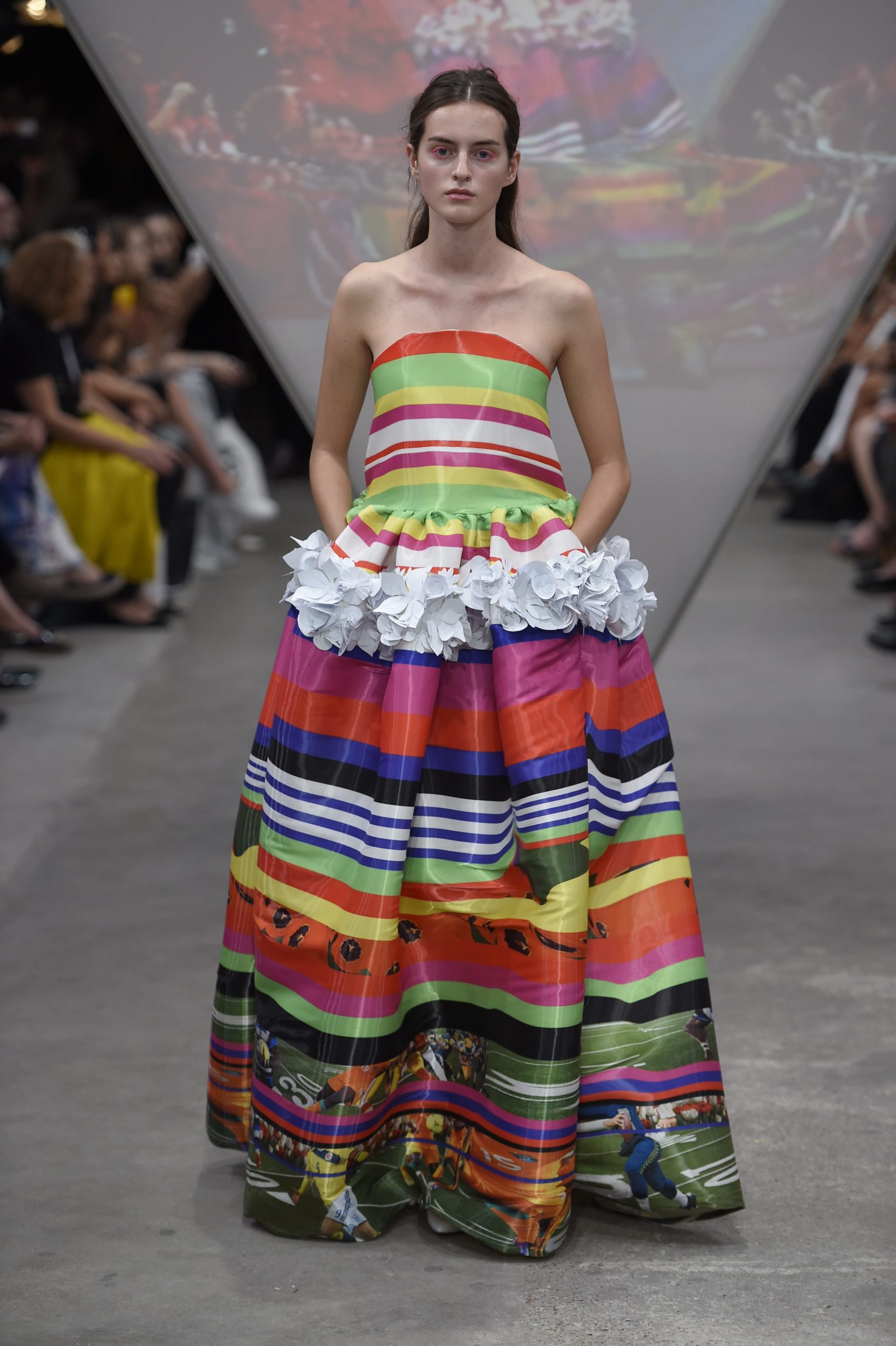 Model walking down catwalk in multi-coloured dress for Fyodor Golan SS15 show, Fashion Innovation Agency